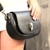 full-grain leather shoulder bag with brass hardware
