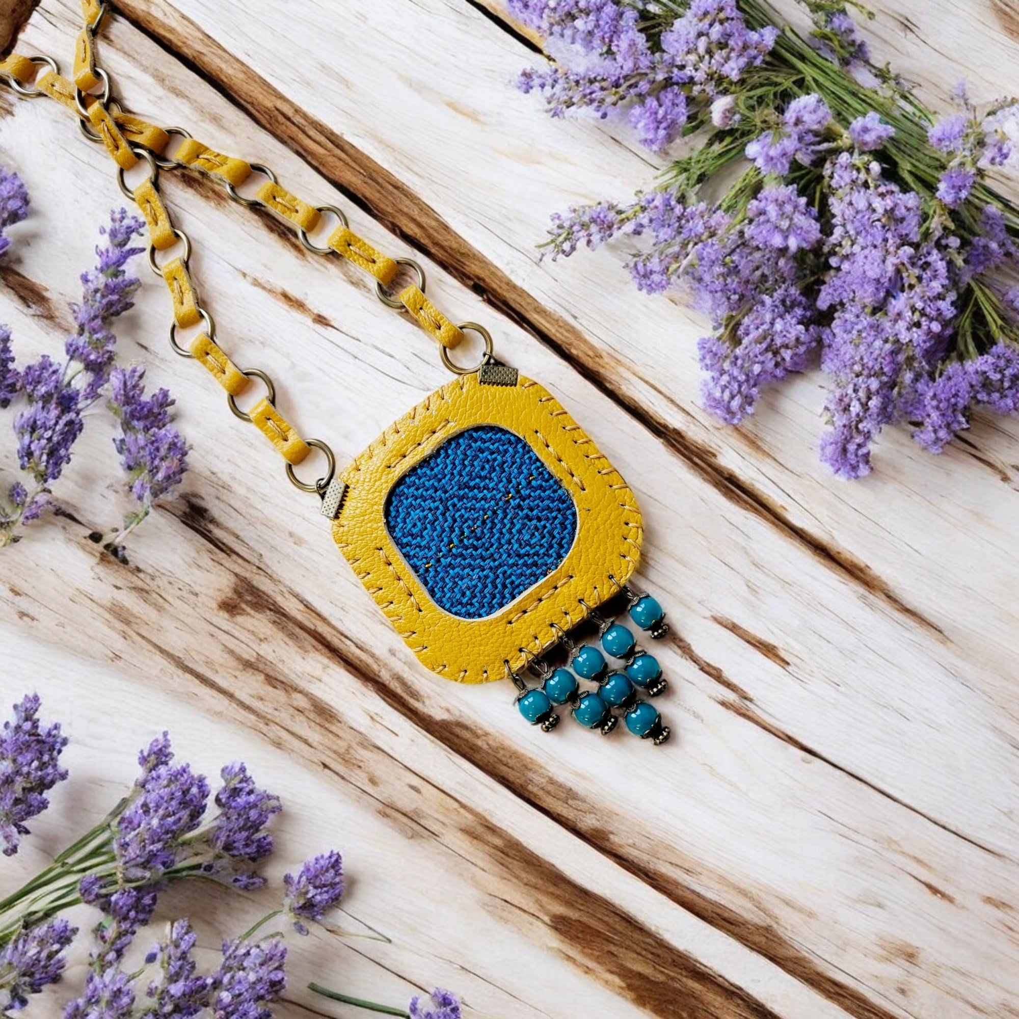 Culture, craft, and contemporary elegance woven into a wearable artwork.