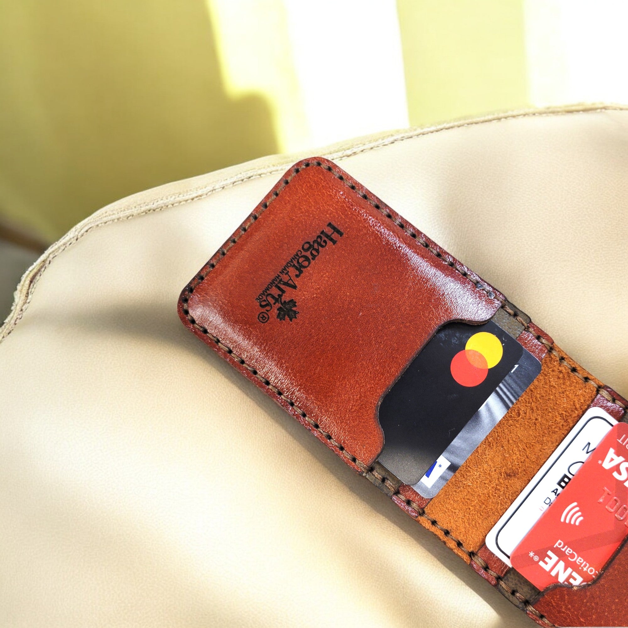 Premium natural leather cardholder, meticulously hand-stitched for durability and elegance by HagorArts Canada.