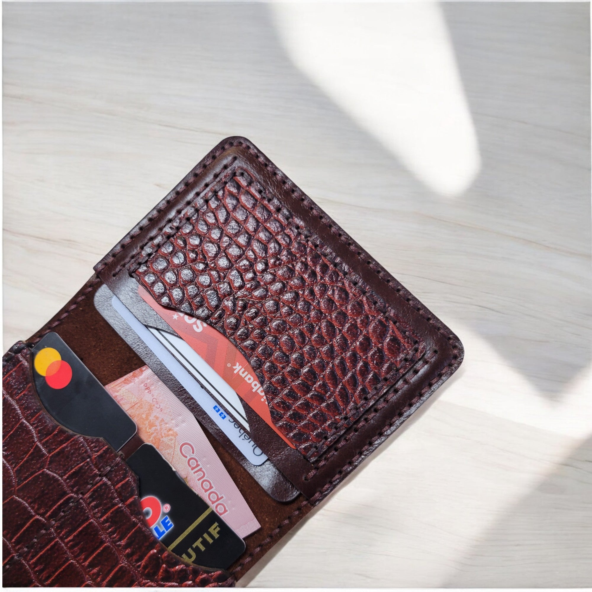 Precision stitching; folded edges for durability in a small form factor.