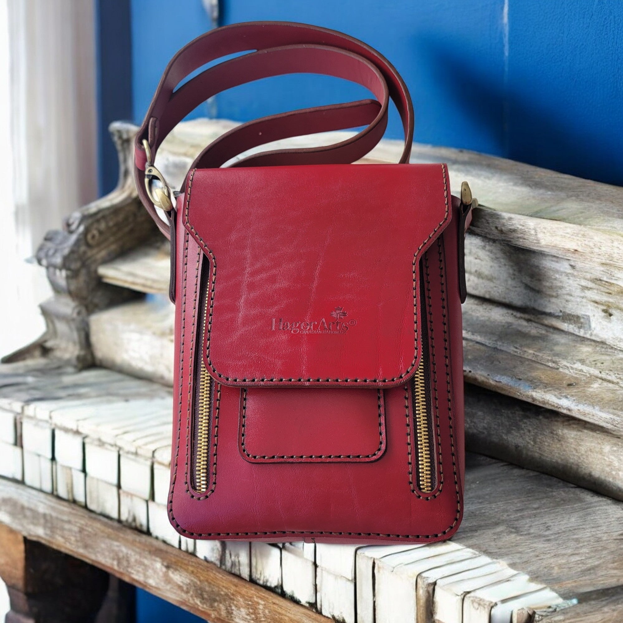 Élan Collection M1 – Handmade red leather crossbody bag with secure card slot and zippered compartments by HagorArts Canada.