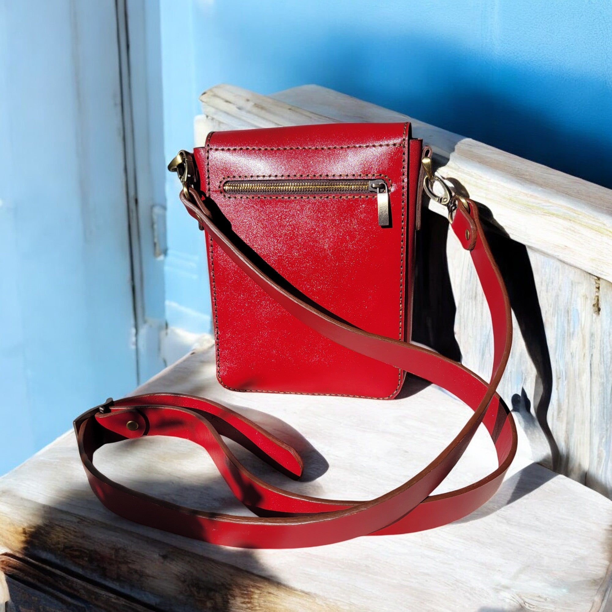 Canadian handmade leather crossbody bag with secure zippered storage and a front magnetic card pocket – HagorArts artisan collection.