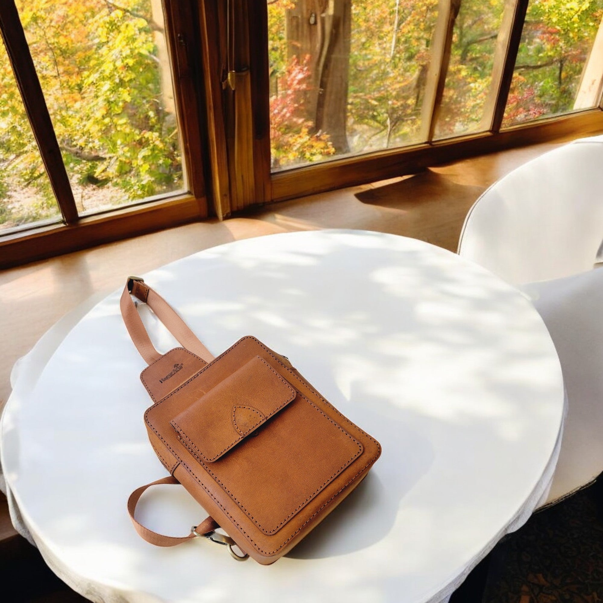 Full-grain, hand-selected leather in classic tan; smooth hand with long-term durability.