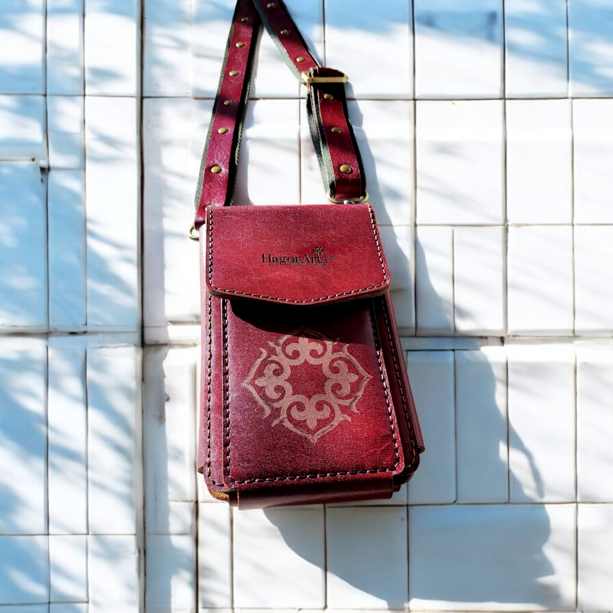 Fiora S4 leather crossbody bag with compact structured body and adjustable strap