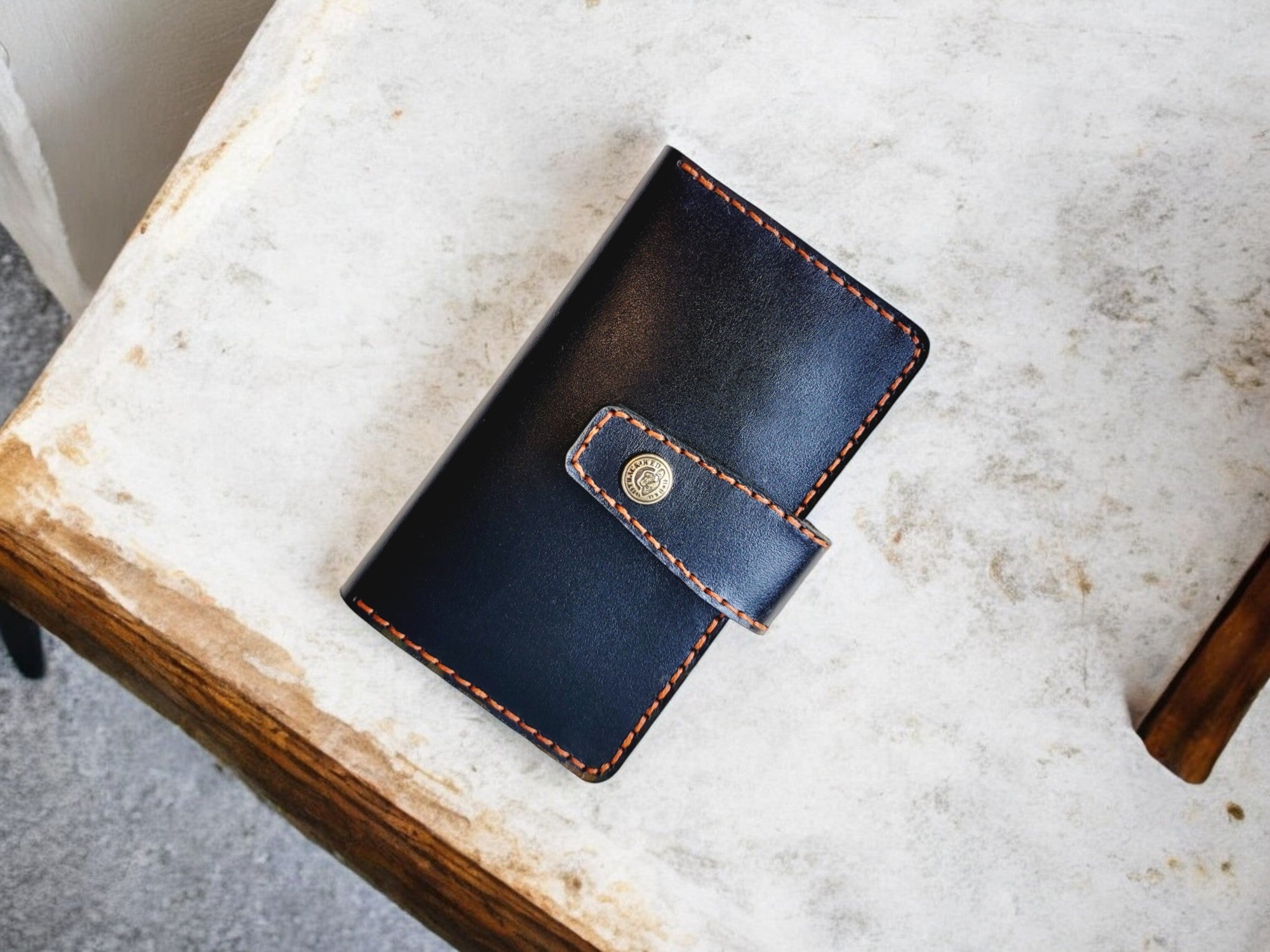 Interior view of black leather cardholder holding multiple business and credit cards.