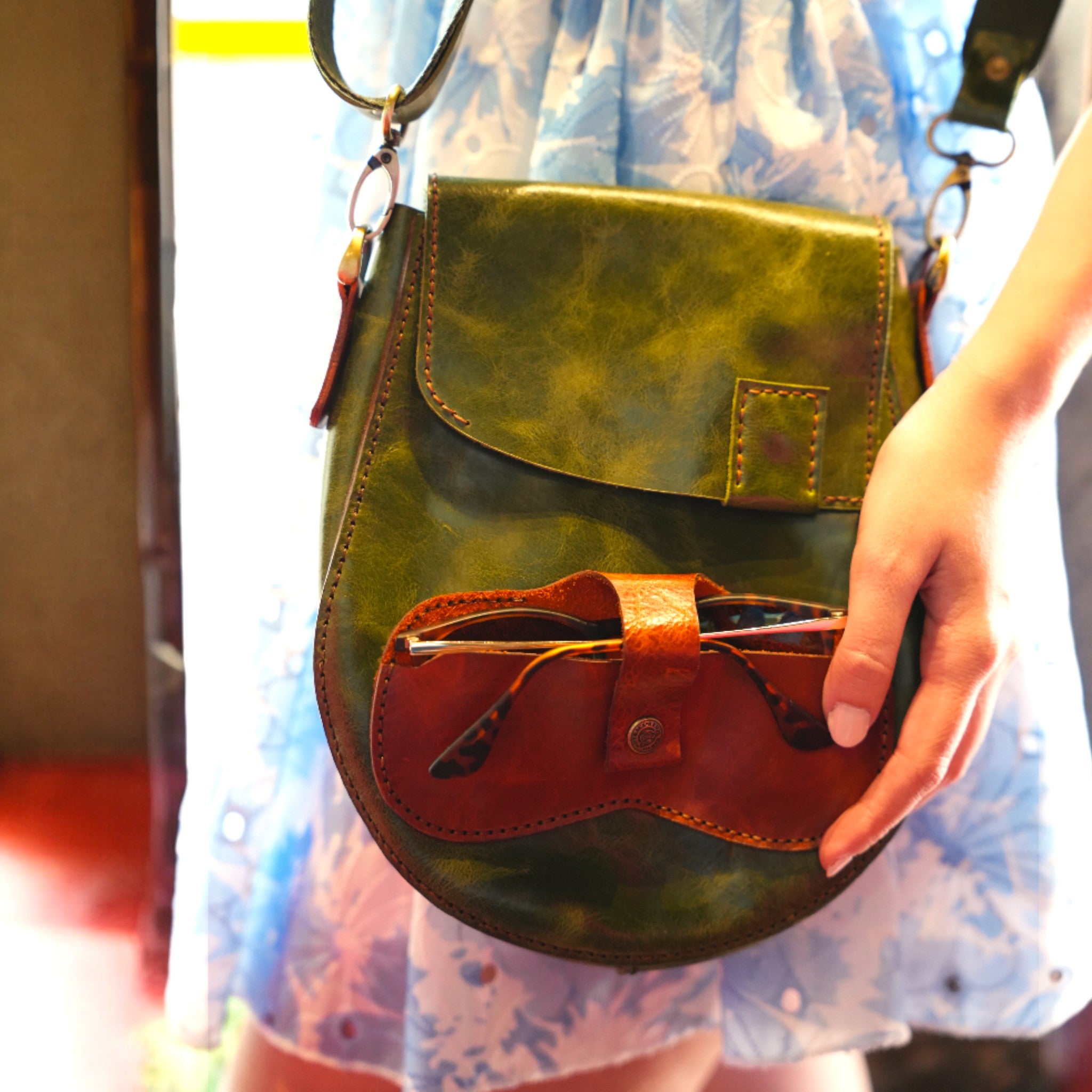 Two-tone leather crossbody bag with front glasses holder. Artisan crossbody bag with unique glasses holder stitched into the front