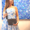 “Bloom C2 violet handmade leather bag with engraved mandala and turquoise clasp — HagorArts.”