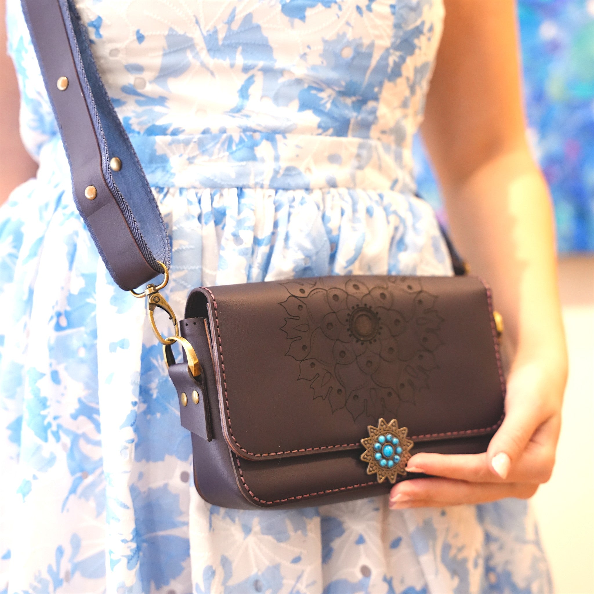 “Canadian handmade leather bag with interior card holder and cash pocket.”